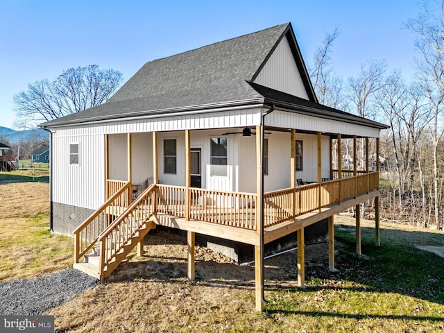 back of property featuring covered porch