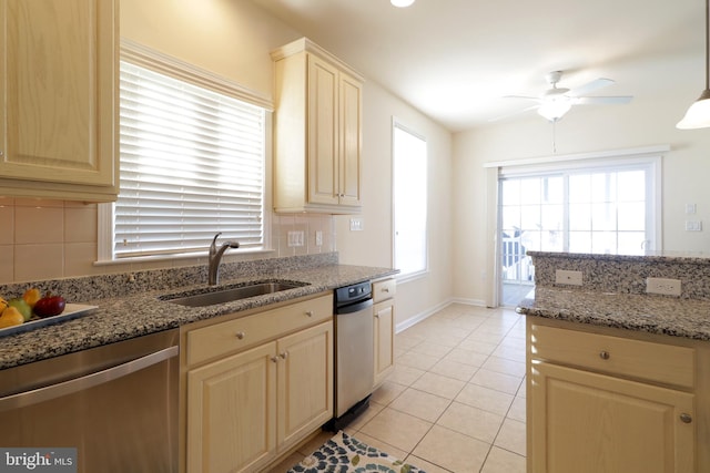 kitchen featuring ceiling fan, sink, pendant lighting, light tile patterned floors, and dishwasher