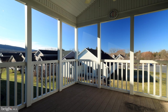 sunroom with vaulted ceiling