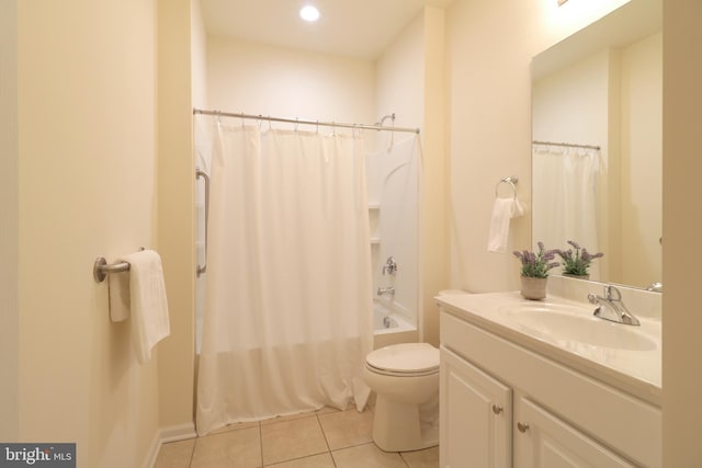 full bathroom with tile patterned flooring, shower / bath combo, toilet, and vanity