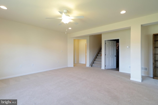 carpeted empty room with ceiling fan