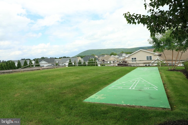 view of community featuring a lawn