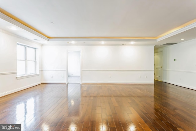7902 Brynmor Ct Unit 201, Pikesville, MD 21208 - spare room with a tray ceiling, crown molding, wood-type flooring, and baseboards