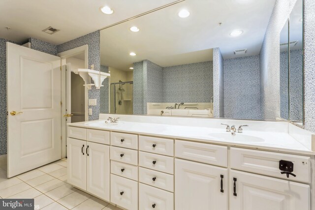 7902 Brynmor Ct Unit 201, Pikesville, MD 21208 - bathroom with a shower stall, tile patterned flooring, double vanity, a garden tub, and recessed lighting