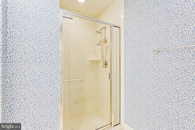 7902 Brynmor Ct Unit 201, Pikesville, MD 21208 - bathroom with a stall shower and wallpapered walls