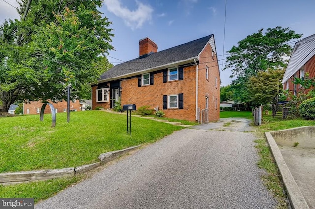 view of home's exterior featuring a yard