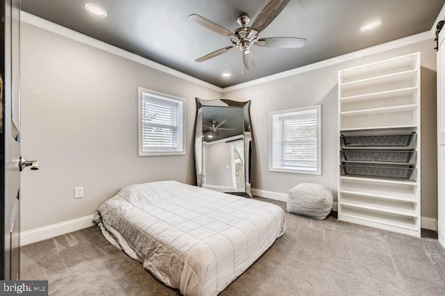 bedroom featuring multiple windows, crown molding, and ceiling fan