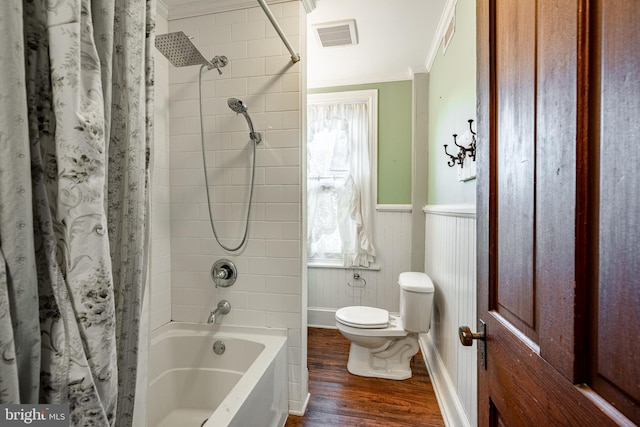 bathroom featuring hardwood / wood-style flooring, toilet, a wealth of natural light, and ornamental molding