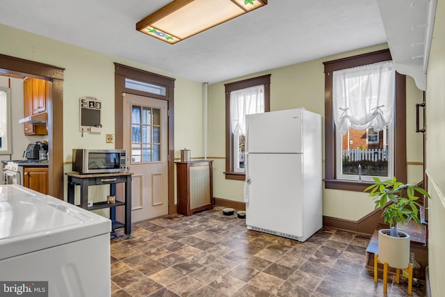 kitchen featuring white fridge