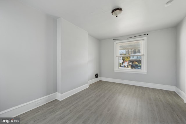 unfurnished room featuring light wood-type flooring