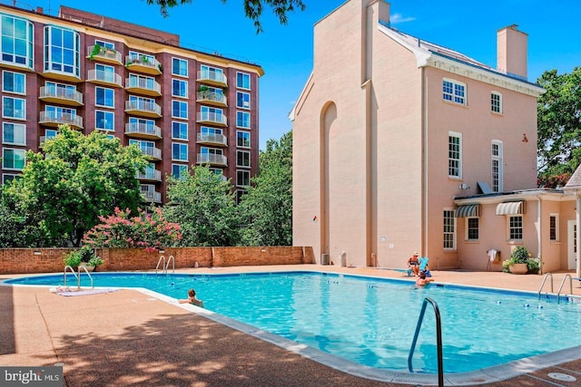 view of pool with a patio area