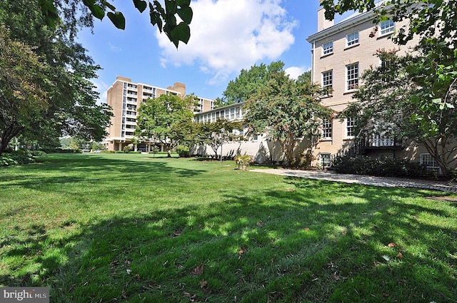 surrounding community featuring a lawn