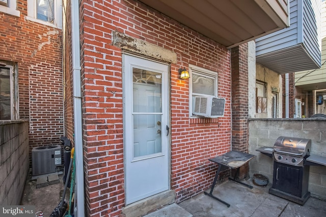 property entrance with central air condition unit