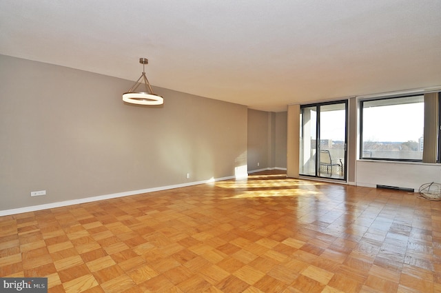 spare room featuring light parquet floors