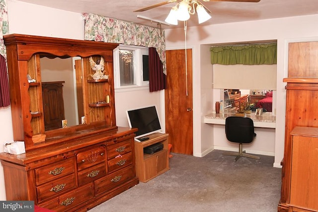 bedroom with ceiling fan and carpet floors