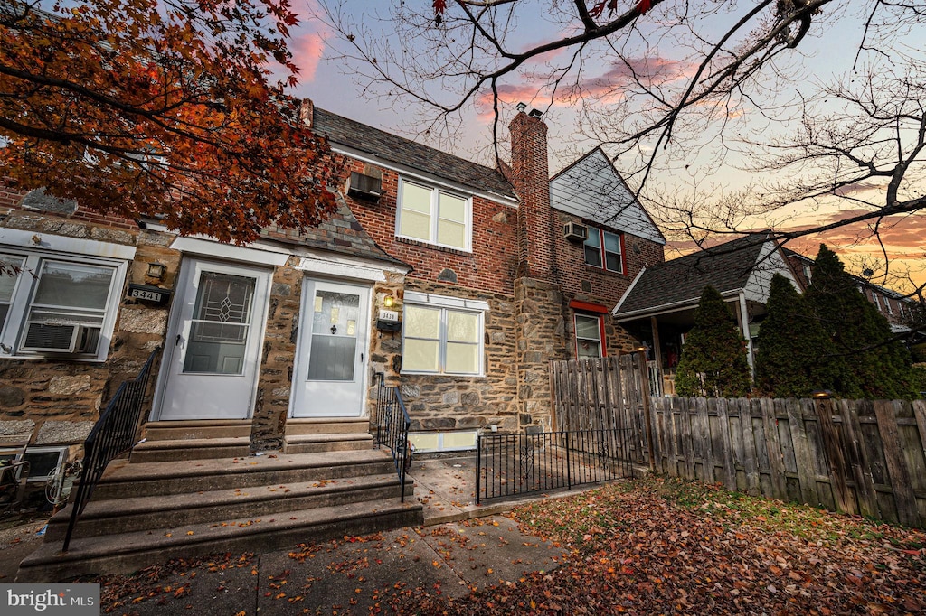 view of front of home featuring cooling unit