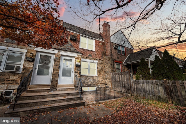 view of front of home featuring cooling unit