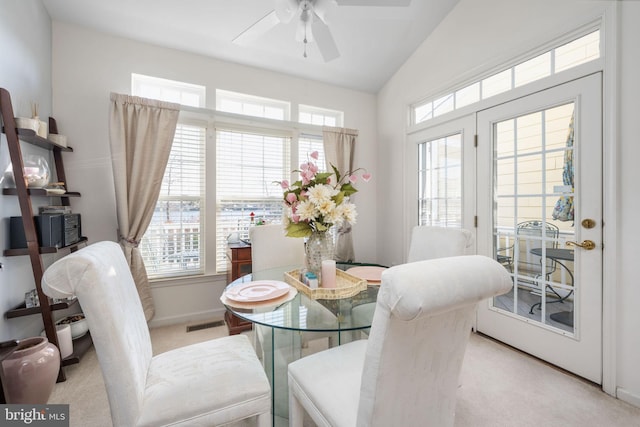 4 Bay View Ln, Colonial Beach, VA 22443 - carpeted dining room featuring ceiling fan, lofted ceiling, and baseboards
