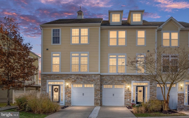 4 Bay View Ln, Colonial Beach, VA 22443 - multi unit property with concrete driveway, stone siding, and an attached garage