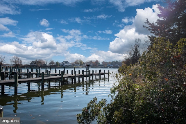 view of dock with a water view