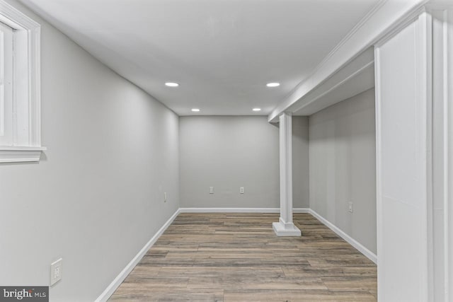 basement featuring hardwood / wood-style flooring