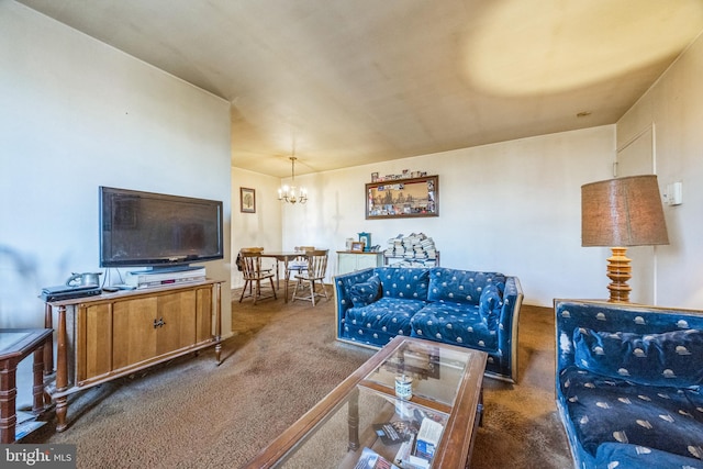 living room with an inviting chandelier and dark carpet