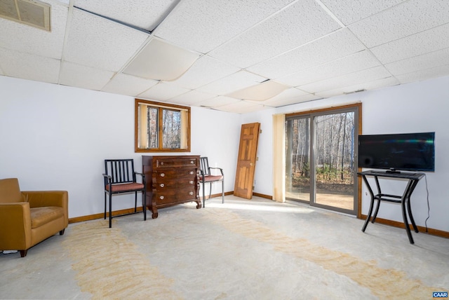 sitting room featuring a paneled ceiling