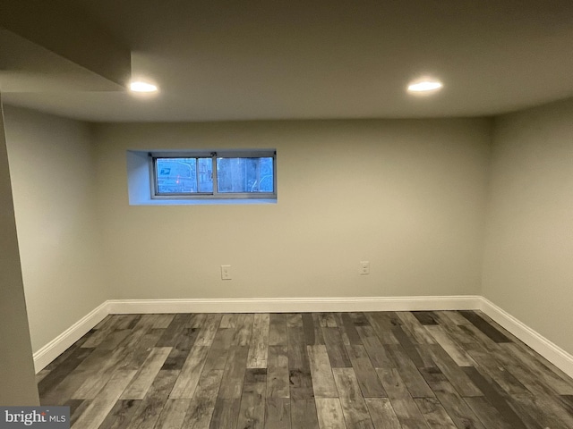 basement featuring dark wood-type flooring