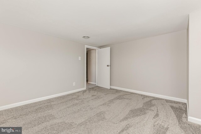 empty room featuring carpet floors