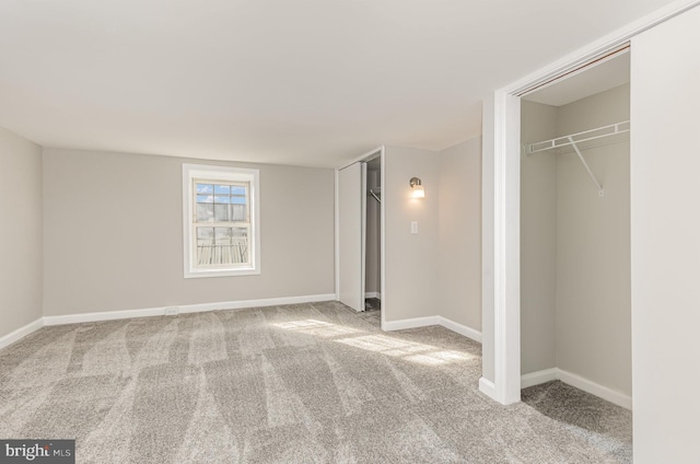 unfurnished bedroom with light carpet