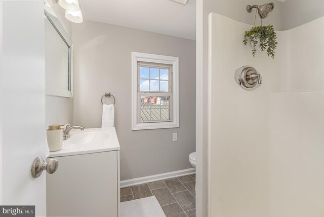 28 W Main St, Fairfield, PA 17320 - full bath with vanity, a shower, baseboards, and toilet