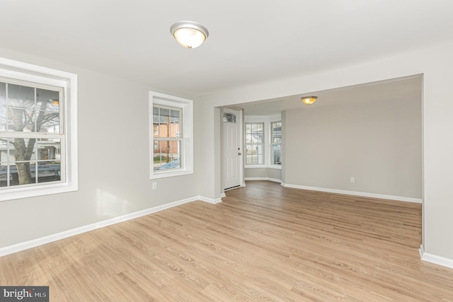 empty room with light wood-type flooring