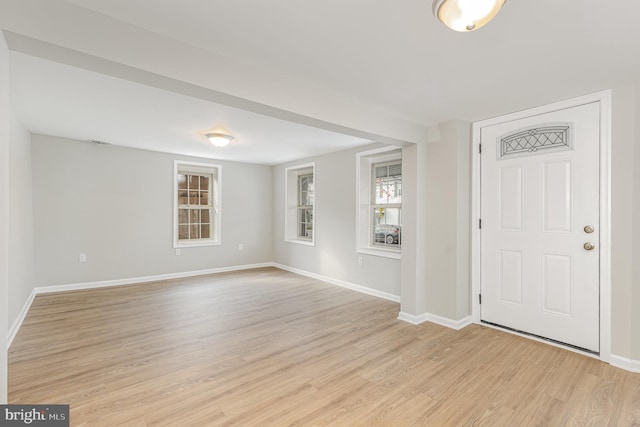 entrance foyer with light hardwood / wood-style flooring