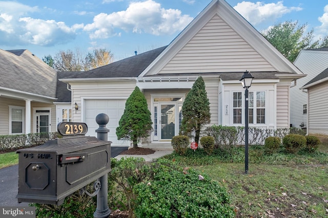 view of front of home with a garage