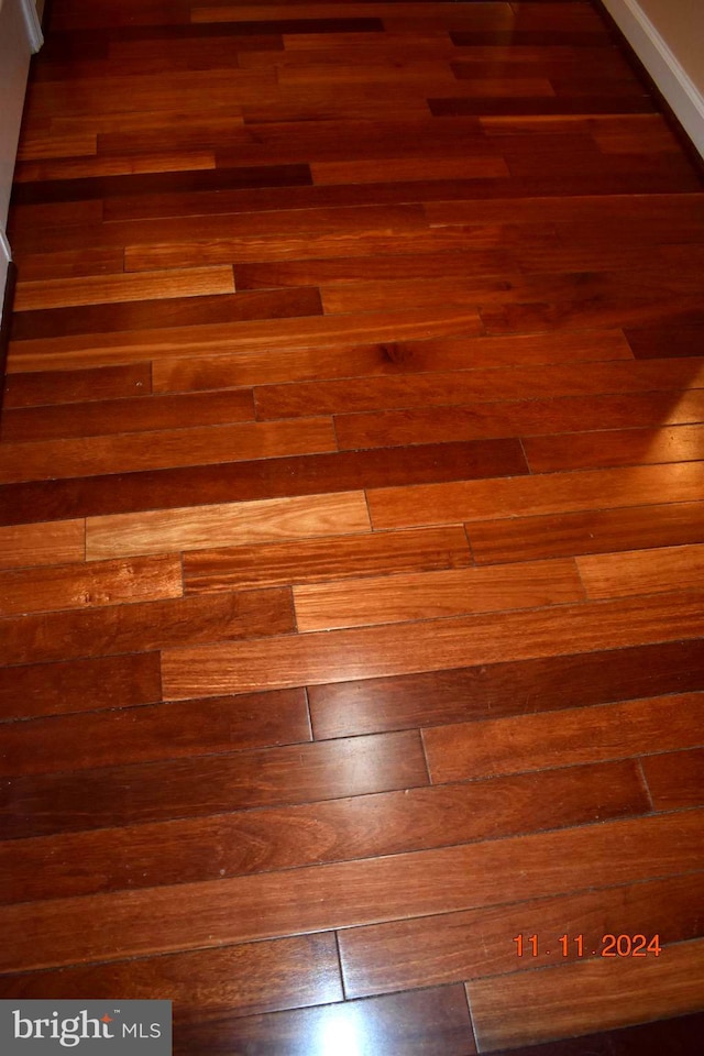 interior details featuring hardwood / wood-style flooring