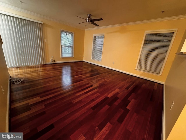 empty room with hardwood / wood-style floors, ceiling fan, and ornamental molding