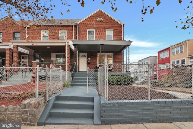 view of property with a porch