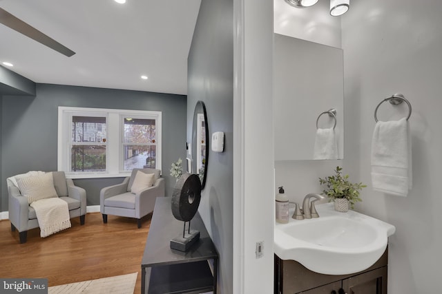 bathroom featuring vanity and wood-type flooring