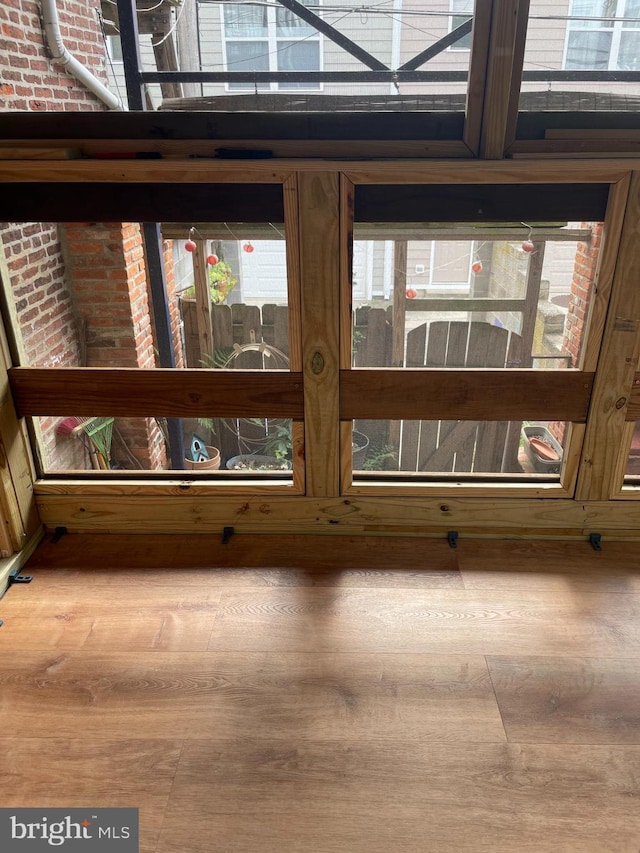 interior details featuring hardwood / wood-style flooring