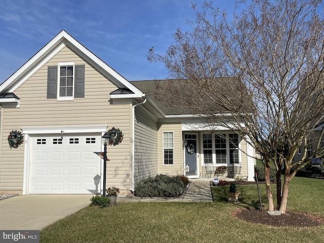 view of front facade featuring a garage and a front yard