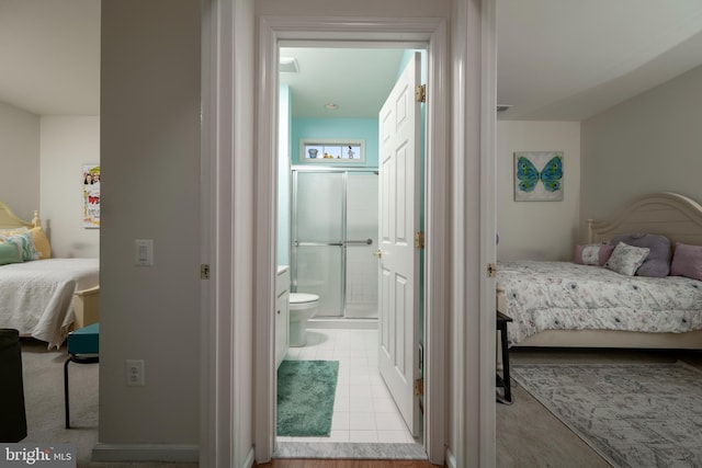 bedroom with connected bathroom