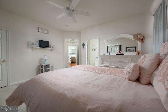 bedroom featuring ceiling fan and light colored carpet