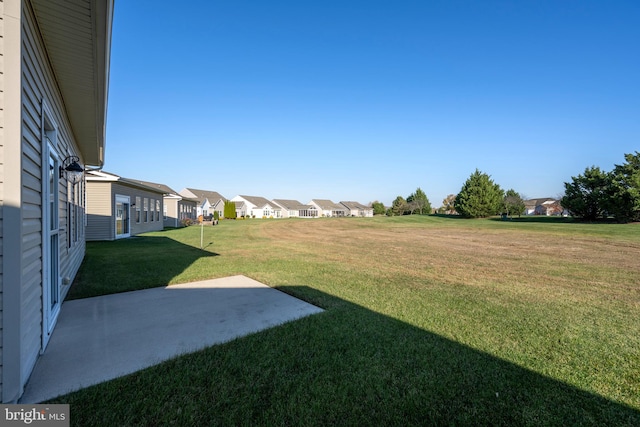 view of yard with a patio area