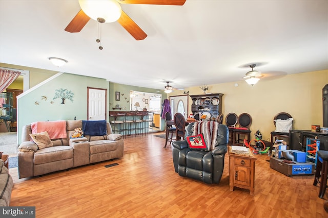 living room with light hardwood / wood-style floors