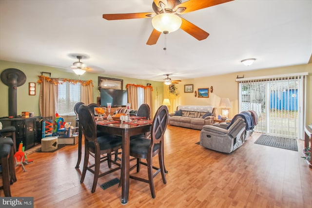 dining room with light hardwood / wood-style flooring