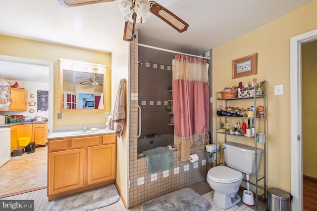 full bathroom with tile patterned flooring, shower / tub combo, vanity, and toilet