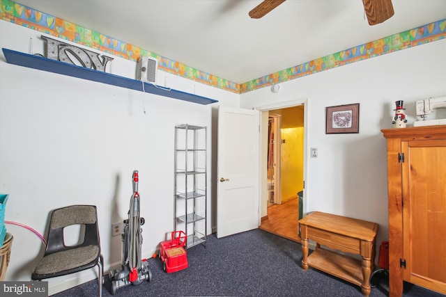 682 Duvall Hwy, Pasadena, MD 21122 - miscellaneous room with a ceiling fan and carpet