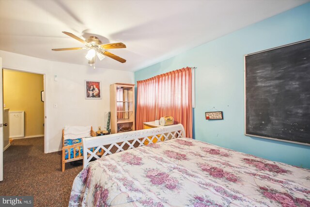 682 Duvall Hwy, Pasadena, MD 21122 - carpeted bedroom with an AC wall unit, ceiling fan, baseboards, and baseboard heating