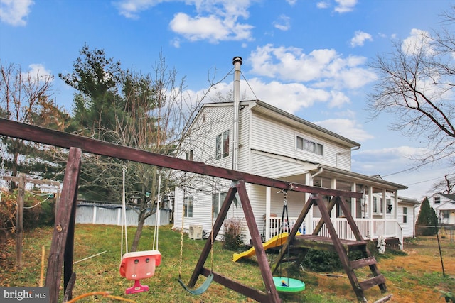 682 Duvall Hwy, Pasadena, MD 21122 - rear view of property with a playground