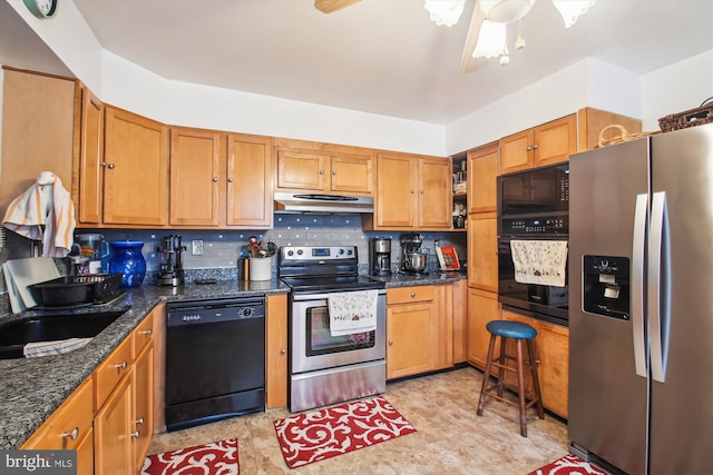 kitchen featuring ceiling fan, sink, dark stone countertops, decorative backsplash, and black appliances